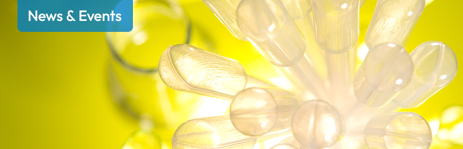 Clear test tube image against a yellow background.